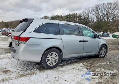 2014 Honda Odyssey Lx z USA, uszkodzony, nr VIN 5FNRL5H27EB098096